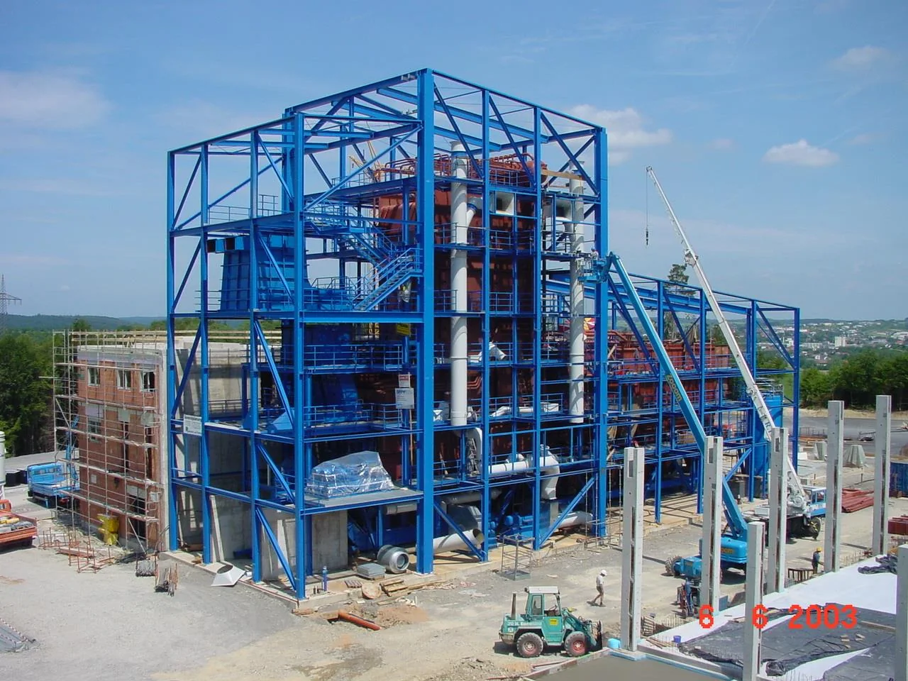 Biomass CHP plant in Buchen with blue boiler structure during assembly